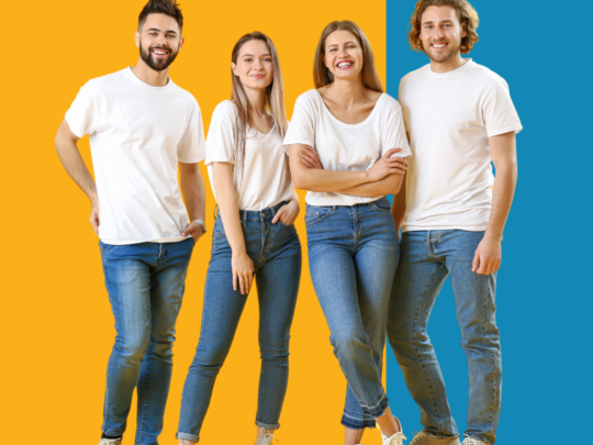 Bubba101 - Group of four young people standing in front of a yellow and blue background.